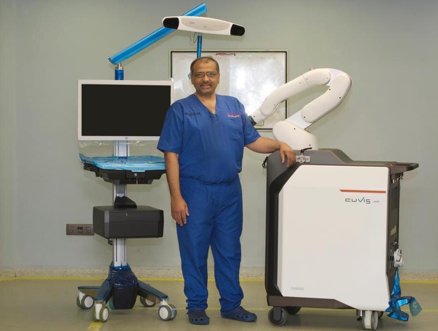 Dr. Ashit Shah with Robotic Knee Replacement Machine